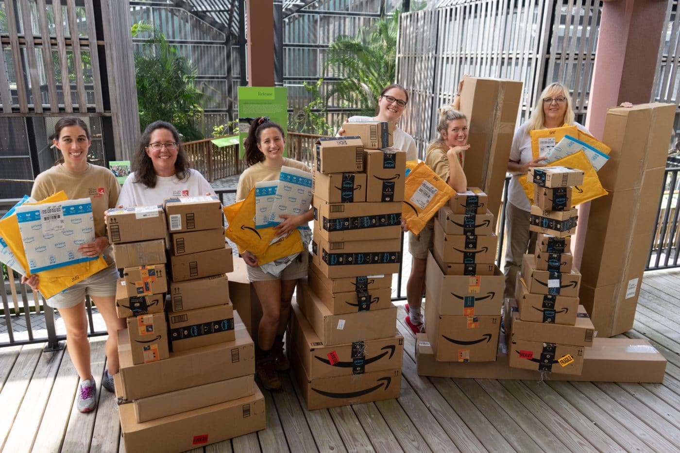Wildlife staff in front of packages sent in from Amazon Wish LIst