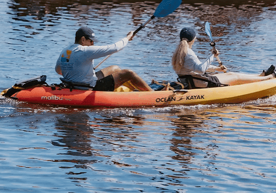 Conservancy Team In Kayak At Great Canoe Races